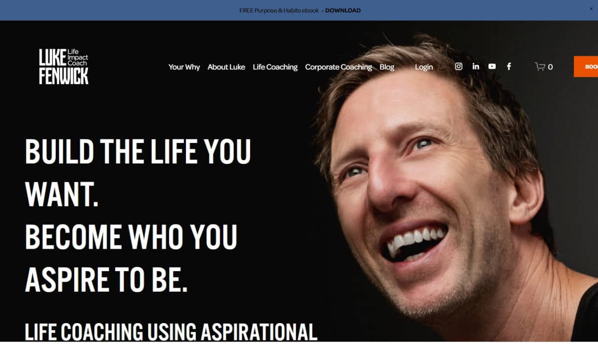 a man smiling with white text